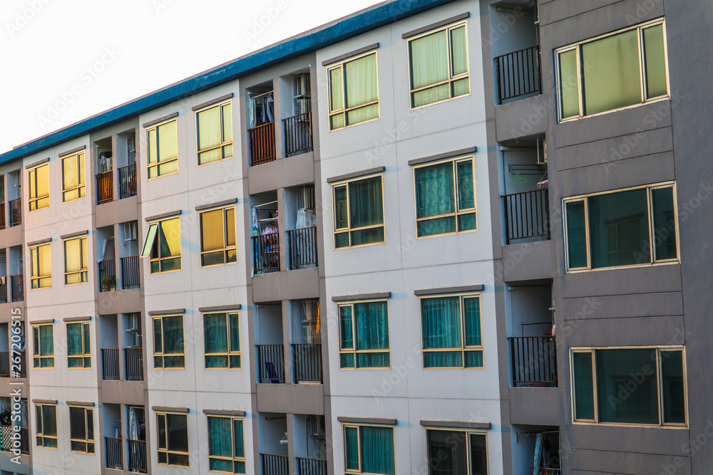 Condominium block city building sunset sky