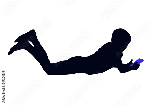 a boy lying down and reading, silhouette vector