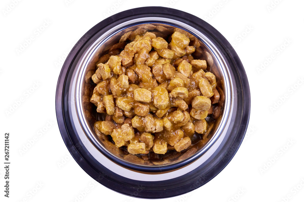 Canned food for cats or dogs in metal bowl isolated on white background