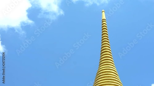 white cloud moving on blue sky over pagoda photo