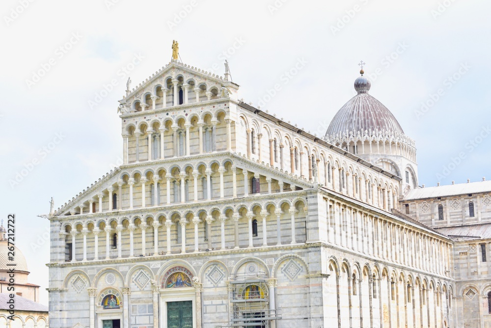 Facade of Pisa Cathedral, a Medieval Roman Catholic Cathedral in Italy