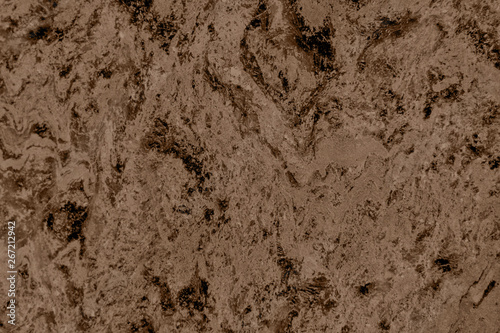 Close up of abstract brown granite stone texture