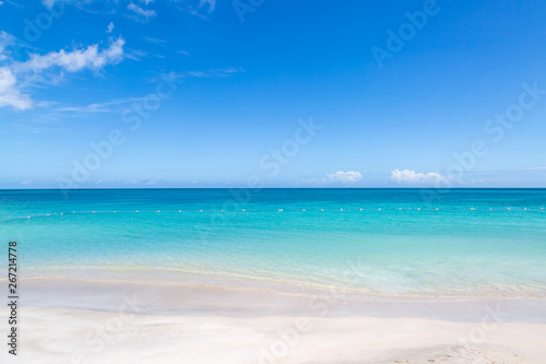 An idyllic sandy beach on the Caribbean Island of Antigua