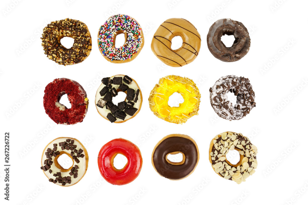 Fototapeta premium Colorful doughnuts with sprinkles isolated on white background.