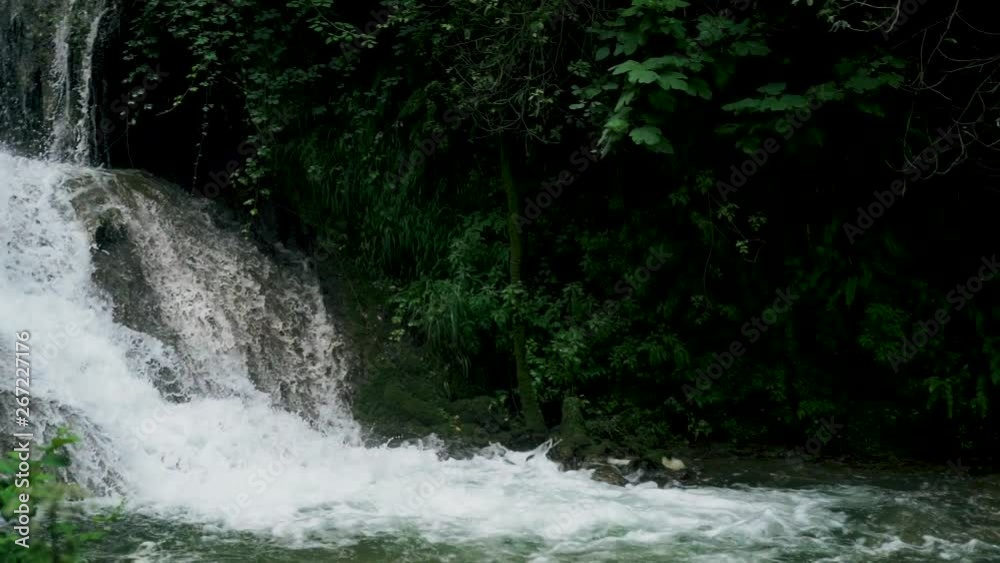 Slow motion shot of water falling down in beautiful italian villa in Tivoli Slow motion shot of water falling down in beautiful italian villa in Tivoli