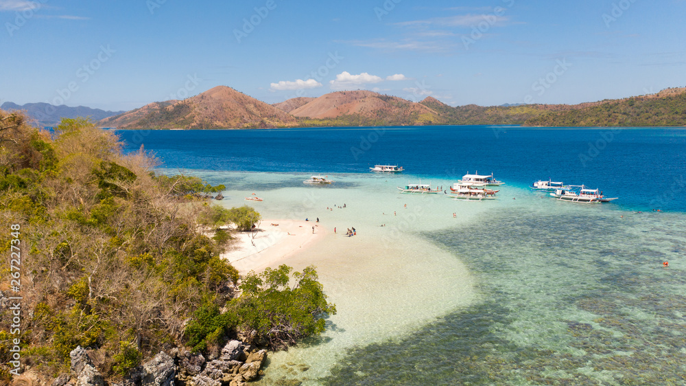 Beautiful lagoon with a white beach. Philippine Islands.Boat tour to beautiful beaches aerial view.Philippines, Palawan