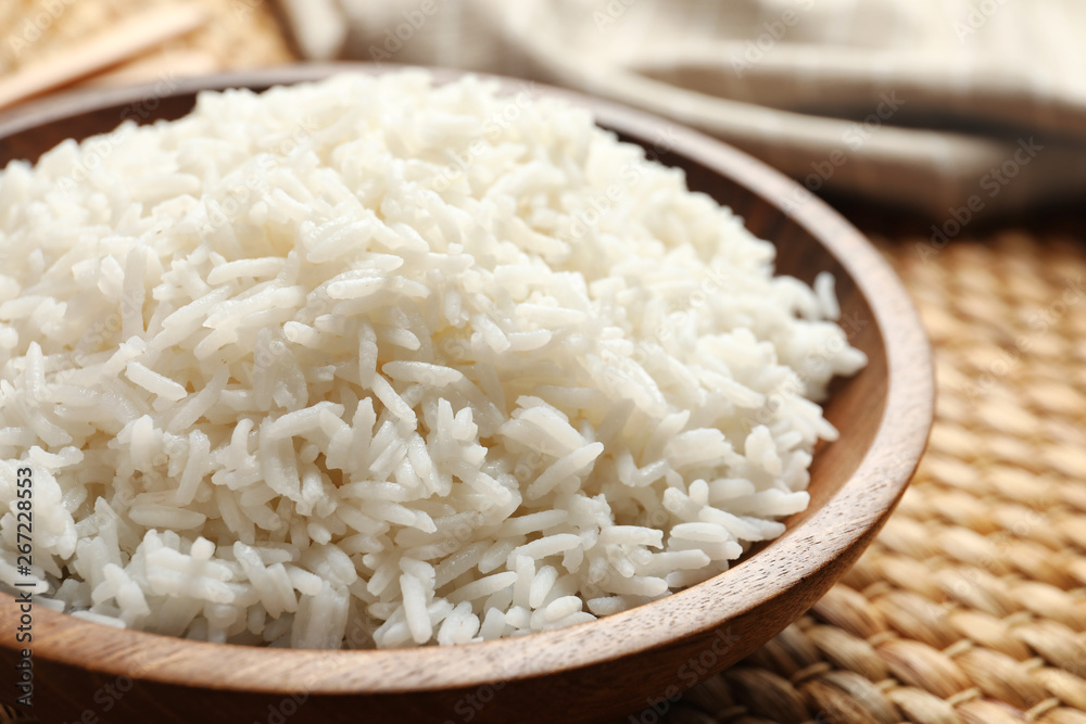 Plate of tasty cooked white rice on table, closeup Plate of tasty cooked white rice on table, closeup