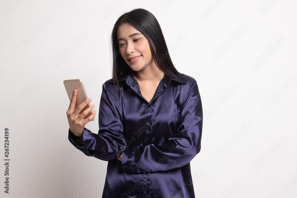 Young Asian woman with mobile phone. Young Asian woman with mobile phone.