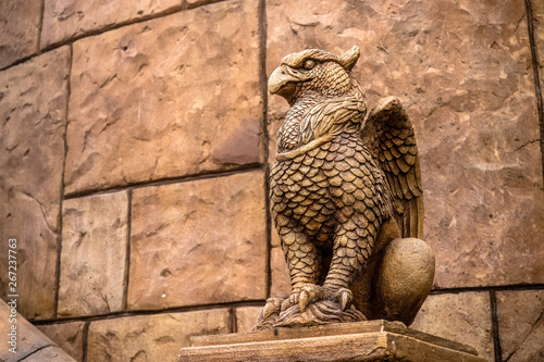 statue of Griffin or griffon a legendary creature with the body of a lion, the head and wings of an eagle