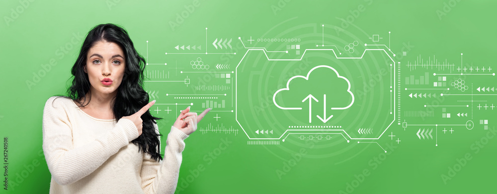 © Tierney - Cloud computing with young woman pointing on a green background