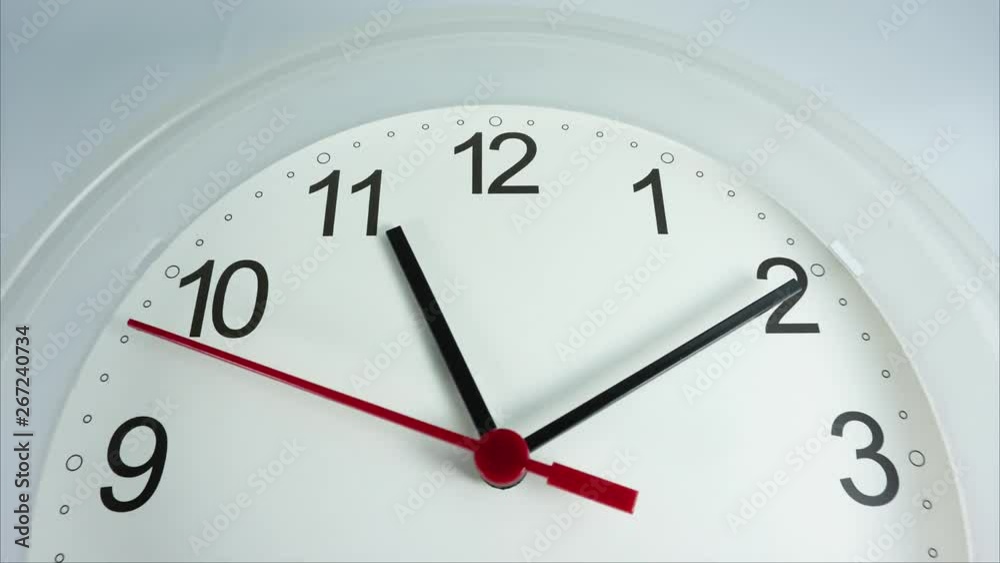 Close-up White clock Beginning of time 11.10 am. and pm. run fast. Time Lapse Clock walking 20 minute. Close-up White clock Beginning of time 11.10 am. and pm. run fast. Time Lapse Clock walking 20 minute.