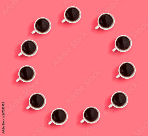 Round frame of coffee cups overhead view flat lay