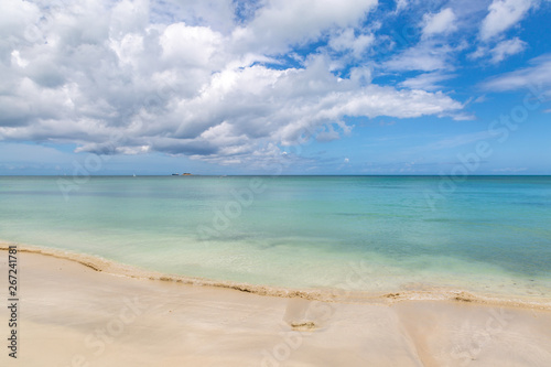 Fototapeta Naklejka Na Ścianę i Meble -  Looking out to sea from an idyllic Antiguan beach