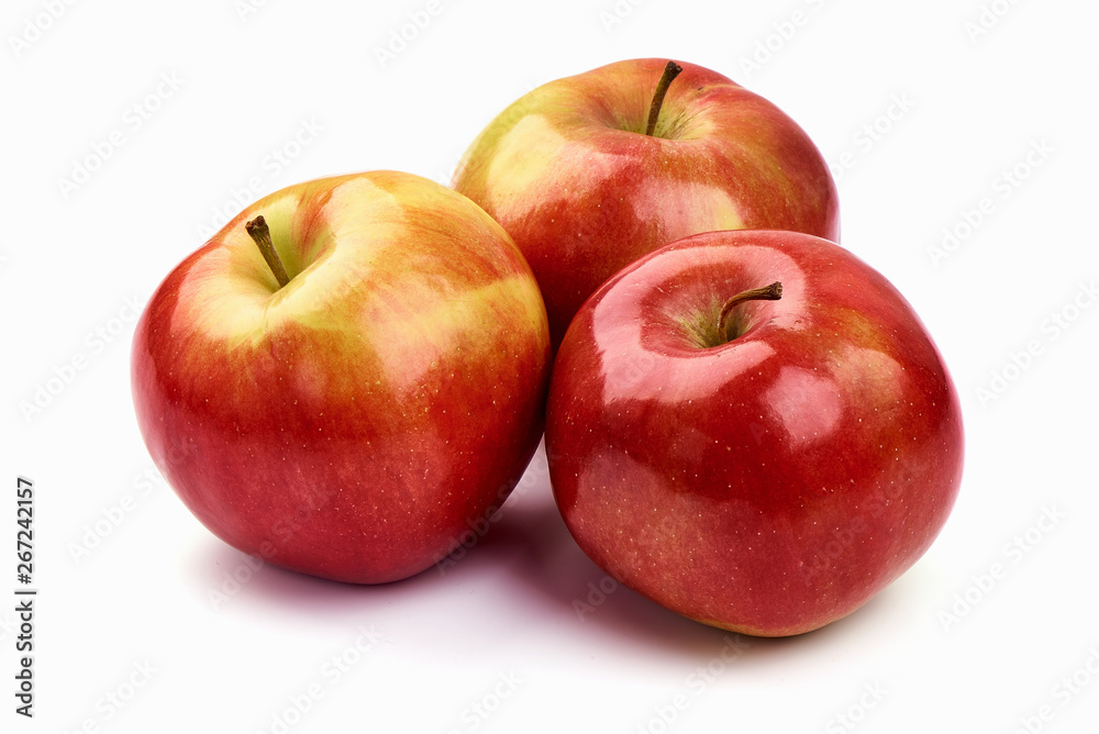 Fresh red apples, close-up, isolated on white background Fresh red apples, close-up, isolated on white background