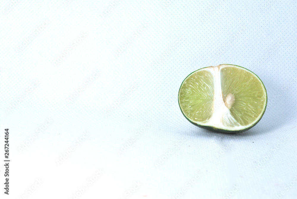 Fresh green lime on a white background