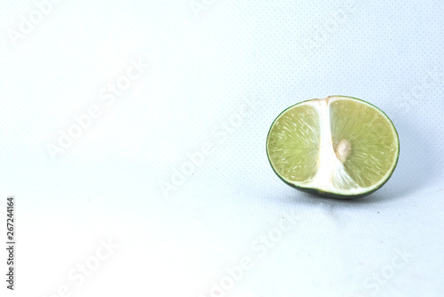 Fresh green lime on a white background