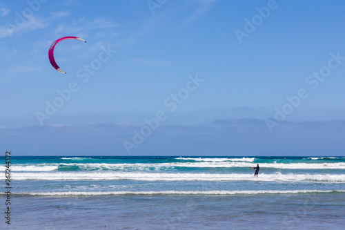 La Caleta, Spain, 03-14-2019 Kite surfer at La Caleta beach. Lanzarote. Canary Islands. Spain.