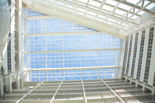 Abstract white building transparent interior glass ceiling rooftop background.