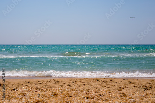 summer seascape with waves and sand