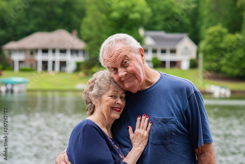 Portrait of a beautiful senior couple in love, celebrating a long, happy marriage and successful retirement.