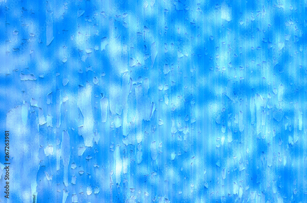 Blue dripping paint splatted stained wall. Used as background. Rough and grungy. Blue dripping paint splatted stained wall. Used as background. Rough and grungy.