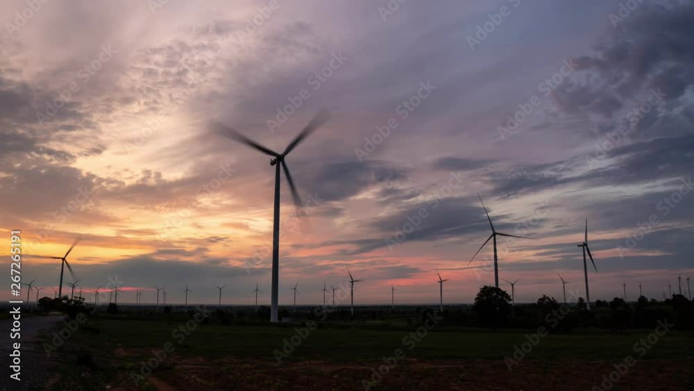 Timelapse 4k-Aerial view of Wind turbines of save Energy save world in video 4k format. aerial shot on sunset. drone footage turbines at sunrise with beautiful clouds Timelapse 4k-Aerial view of Wind turbines of save Energy save world in video 4k format. aerial shot on sunset. drone footage turbines at sunrise with beautiful clouds