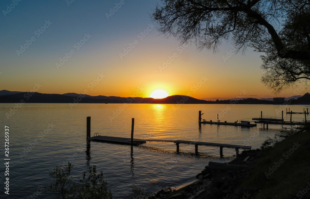 Empty boat docks at sunset on lake Coeur d'Alene Idaho Empty boat docks at sunset on lake Coeur d'Alene Idaho