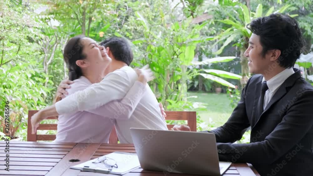 Asian Senior couple sitting with financial advisor. Big win mood, hugging and exciting pose. Retirement preparation concept. Asian Senior couple sitting with financial advisor. Big win mood, hugging and exciting pose. Retirement preparation concept.