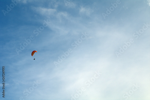 kite flying in the sky,motorized paraglider, fly, paragliding, blue, flying, sport, air,  adventure, extreme, freedom, 