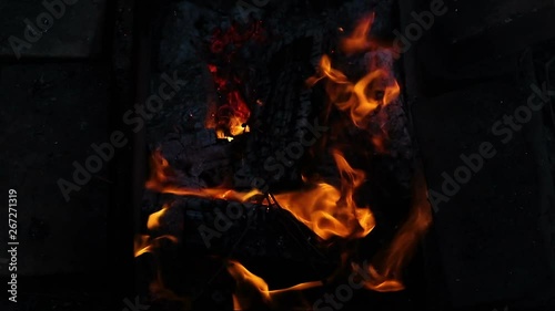fire burns, the coals in the fire top view