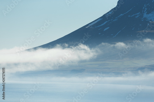 Foggy landscape of the fjords of Iceland