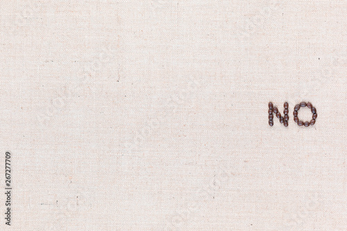 The word No written with coffee beans, aligned to the right.