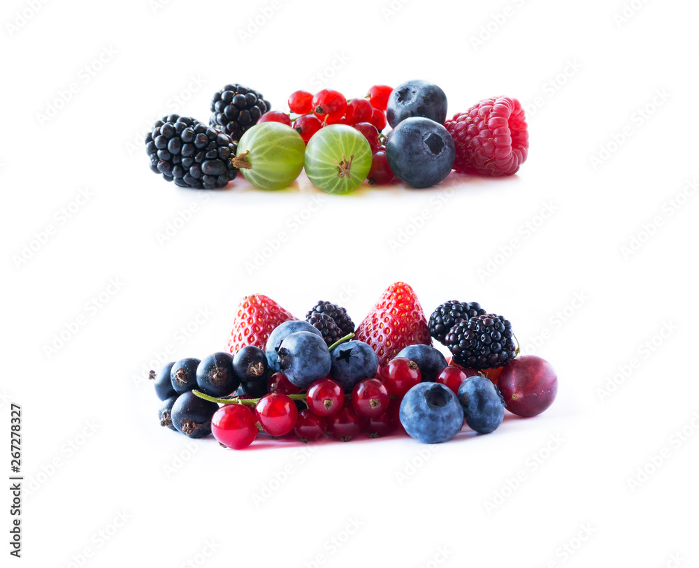 Ripe blueberries, blackberries, blackcurrants, strawberries, raspberries, gooseberries and red currants. Mix fruits on white background. Mix berries with copy space for text. Ripe blueberries, blackberries, blackcurrants, strawberries, raspberries, gooseberries and red currants. Mix fruits on white background. Mix berries with copy space for text.