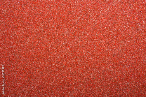 Texture of red sandpaper.Rough sandpaper background.