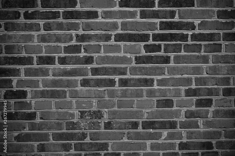 Fototapeta premium The brick texture, wall, with cracks and scratches can be used as a background