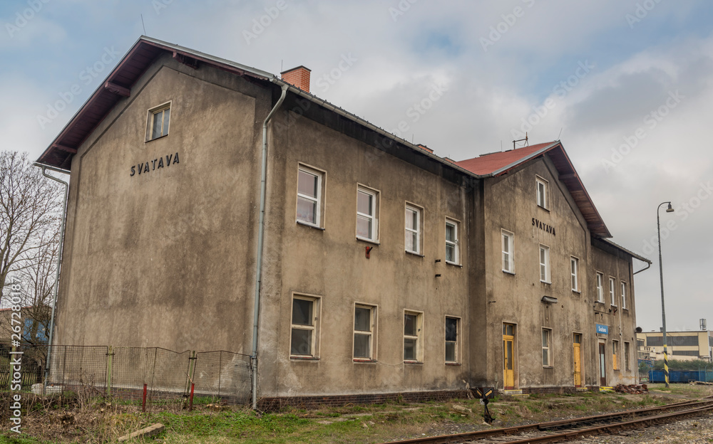 Svatava station with big building and platform in spring day