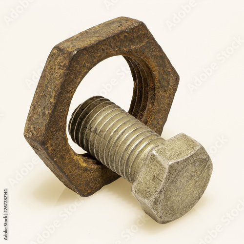 Bolt and nut on white background