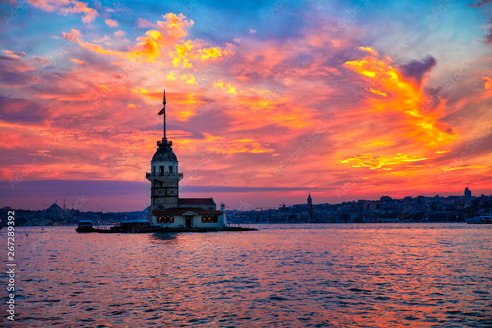View of the Maiden Tower in Istanbul City of Turkey. Historical Tower and sunset at Bosphorus.