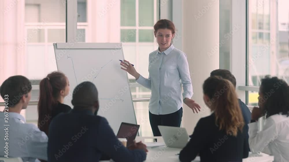 Woman manager coach mentor giving presentation at business training