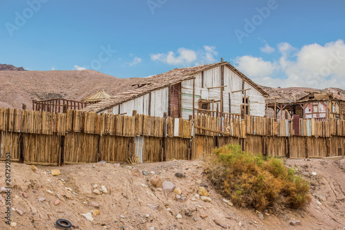 wooden ranch building wild west western style in rural country side American dry scenic landscape environment 