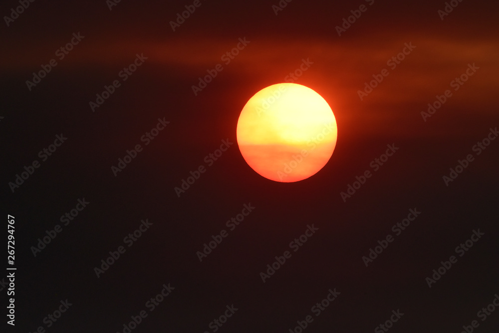 Beautiful orange sun at sunset Beautiful orange sun at sunset