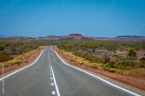 Empty road in Western Australia leading towards Karijini National Park