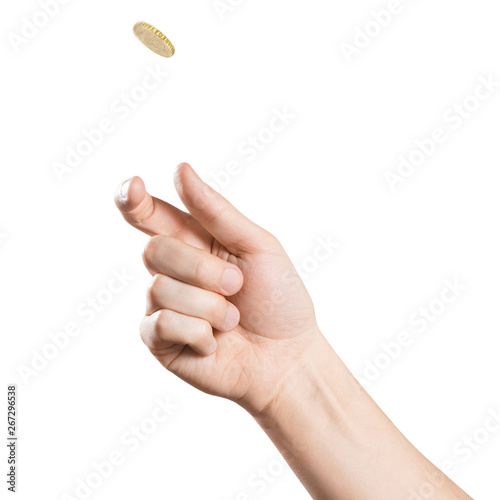 Hand throwing up a coin, isolated on white background photo