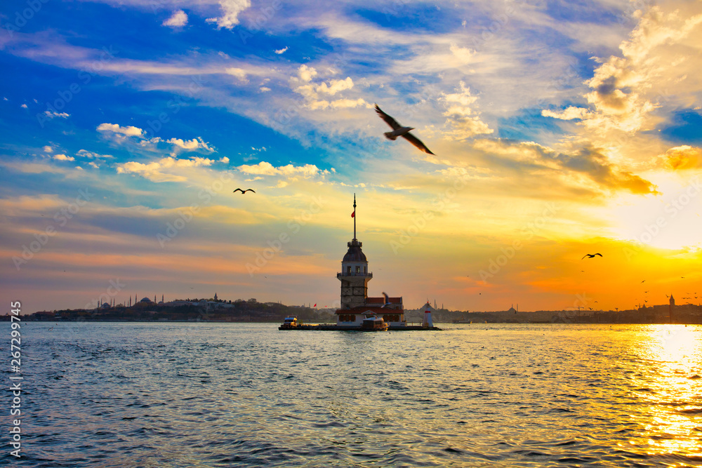 View of the Maiden Tower in Istanbul City of Turkey. Historical Tower and sunset at Bosphorus.	