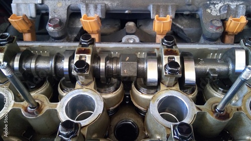 Closeup of opened gasoline engine bay.
