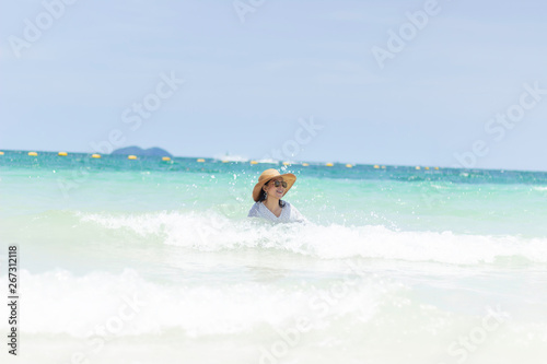 Young women traveling relax on the beach on summer  Concept beach on summer