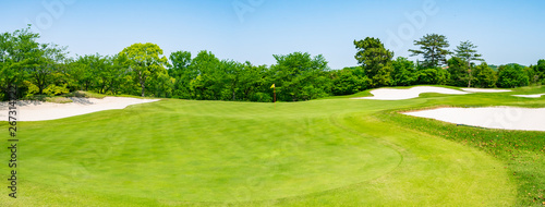 Fototapeta Naklejka Na Ścianę i Meble -  Panorama View of Golf Course with beautiful green. Golf is a sport to play on the turf