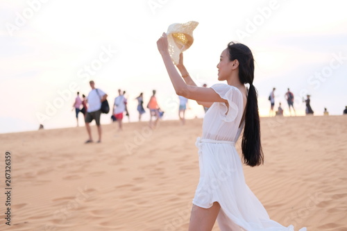 woman tourist and relaxing at white sand dunes