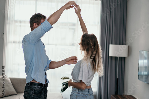 Intimate couple dancing at home. romance and love