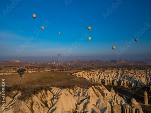 Turkey - February, 2019: Magnificent dawn with hot air balloons. Cappadocia, Goreme